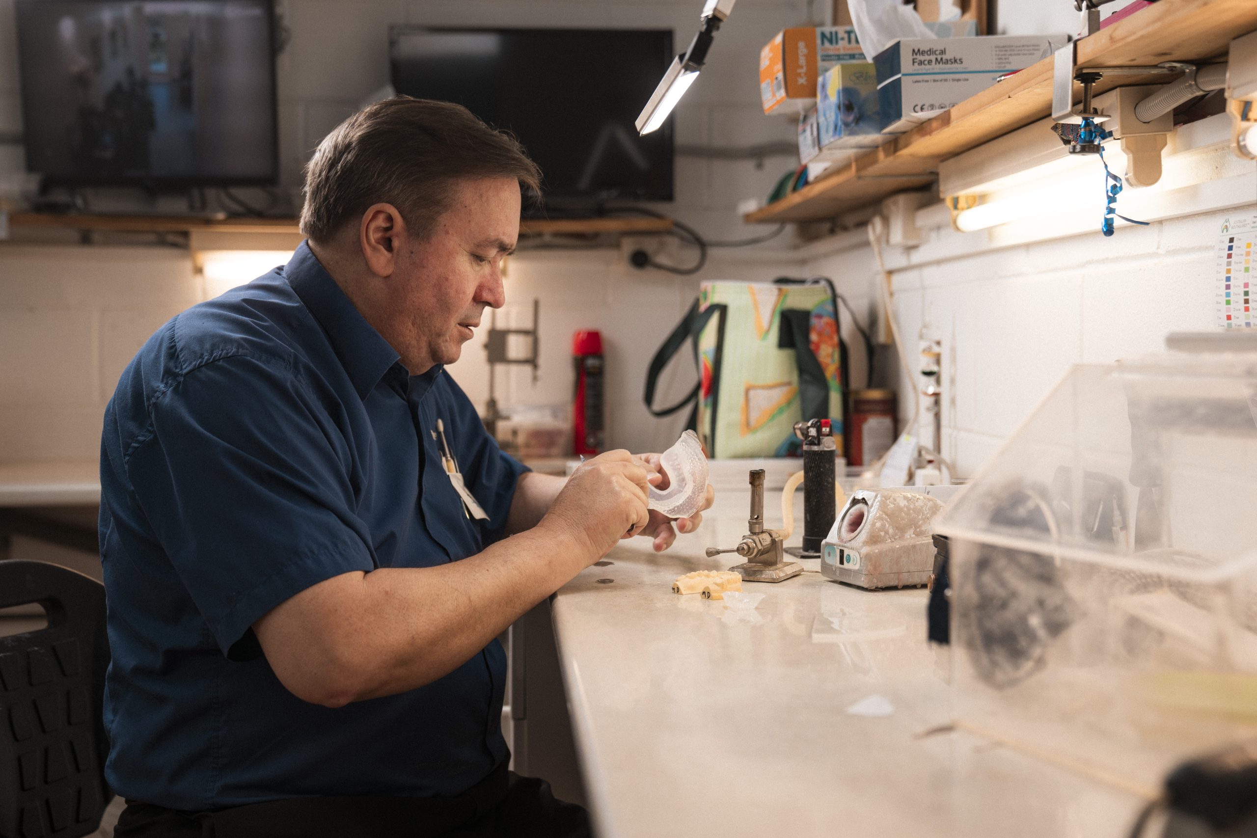 Dental technician working at the laboratory